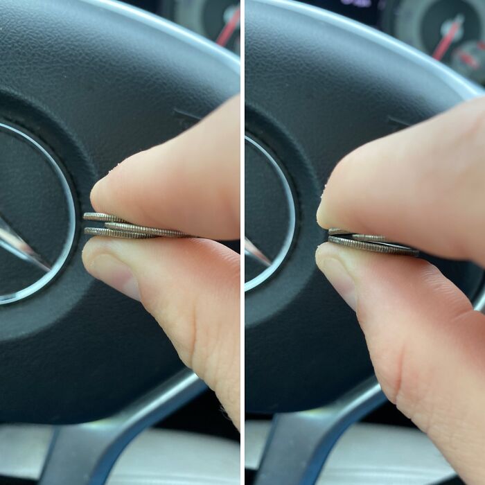 Close-up of fingers holding stacked coins showing a simple genius life hack used by people inside a car.
