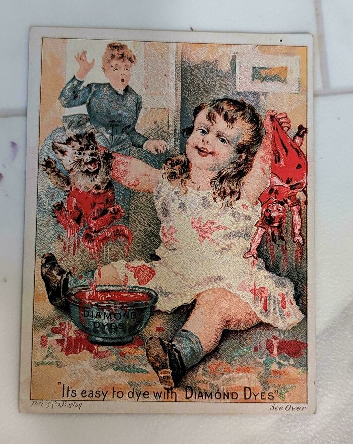 Vintage advertisement showing a child covered in red dye with a shocked woman in the background, illustrating vintage advertisements.