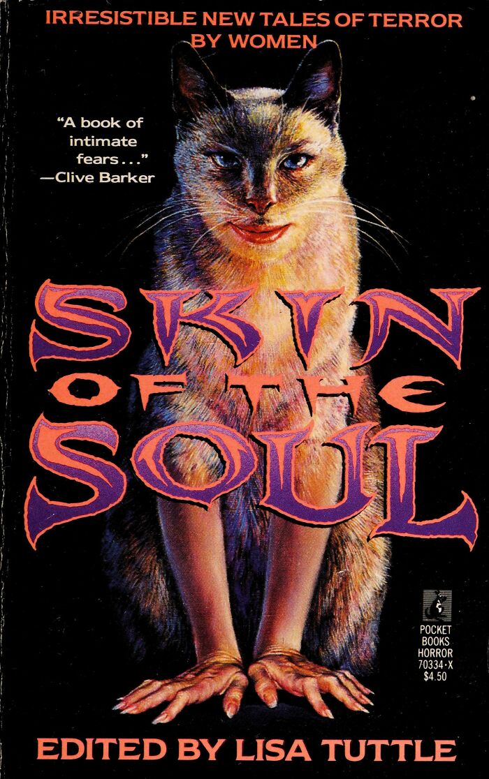 Book cover showing a cat with a human face and hands for a creepy horror anthology, highlighting awful funny book covers.
