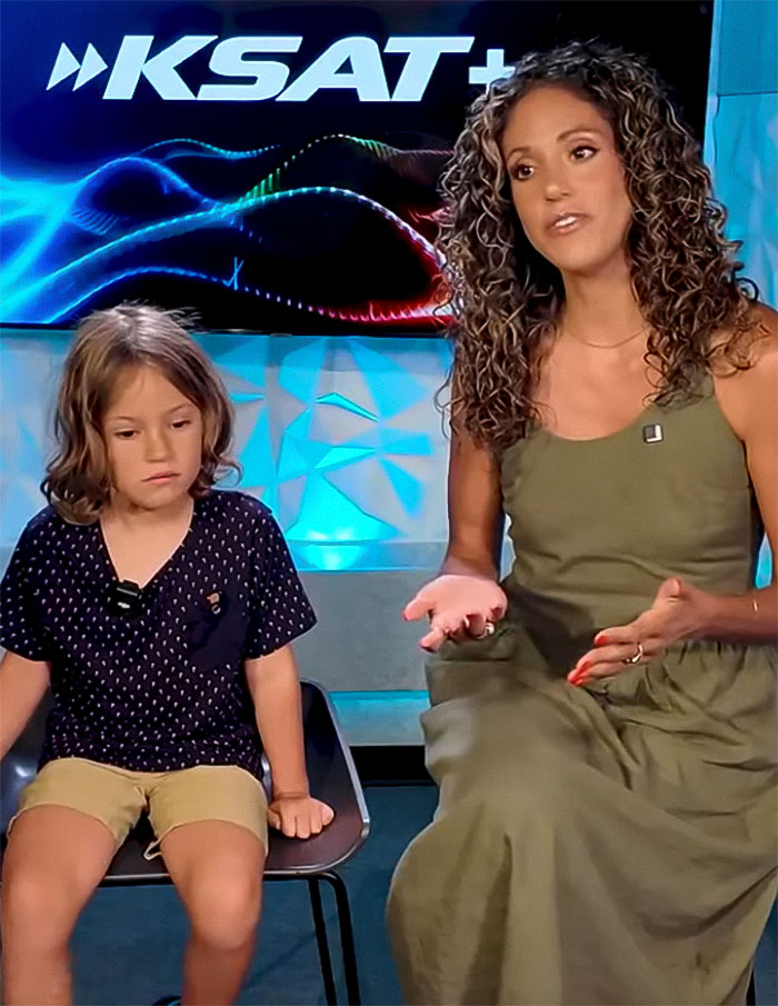 Mom of 6yo boy and her son sitting in studio, discussing octopus attack and accusing aquarium of lying on KSAT news. - 7