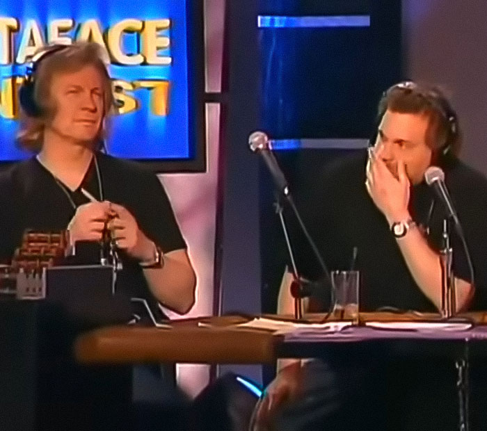 Two men wearing headphones at a table with microphones discussing the Miss Buttaface Zendaya ugly woman contest controversy. Two men wearing headphones at a table with microphones discussing the Miss Buttaface Zendaya ugly woman contest controversy.