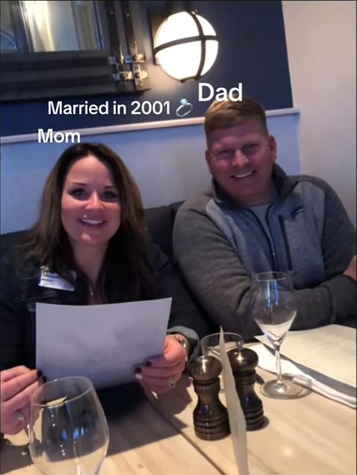 Mom and Dad smiling at a restaurant table, family historian sharing their family tree and inspiring others online.