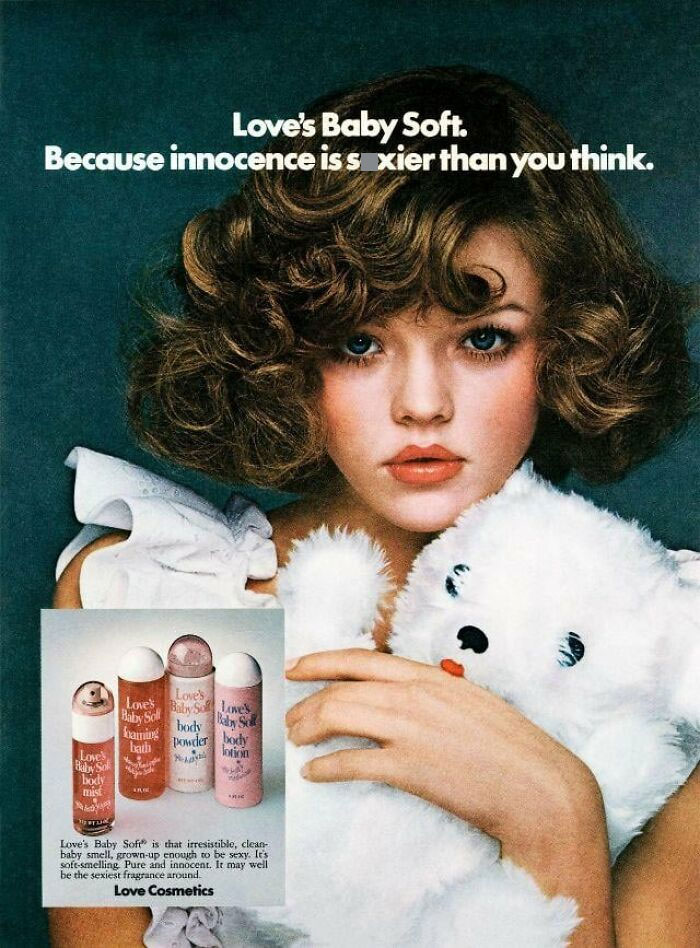 Vintage advertisement featuring a young woman holding a teddy bear promoting Baby Soft fragrance from vintage advertisements.