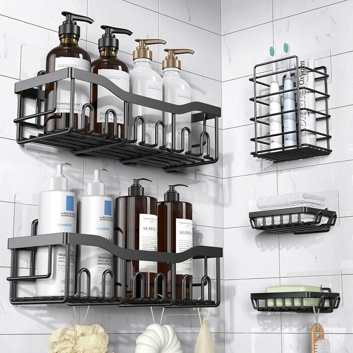 Wall-mounted bathroom shelves with toiletries and toothbrushes, showcasing Amazon best seller organization products.