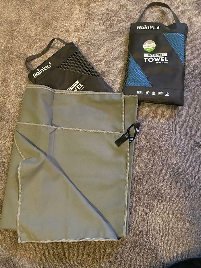 Rainleaf microfiber towels laid out on carpet, featuring packaging and folded towel highlighting best seller quality.