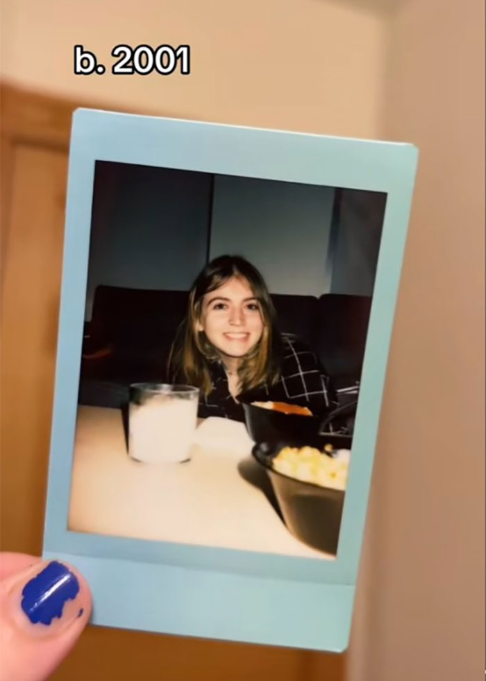 Polaroid photo of a young woman smiling indoors, illustrating the family historian who inspired sharing family tree stories online.