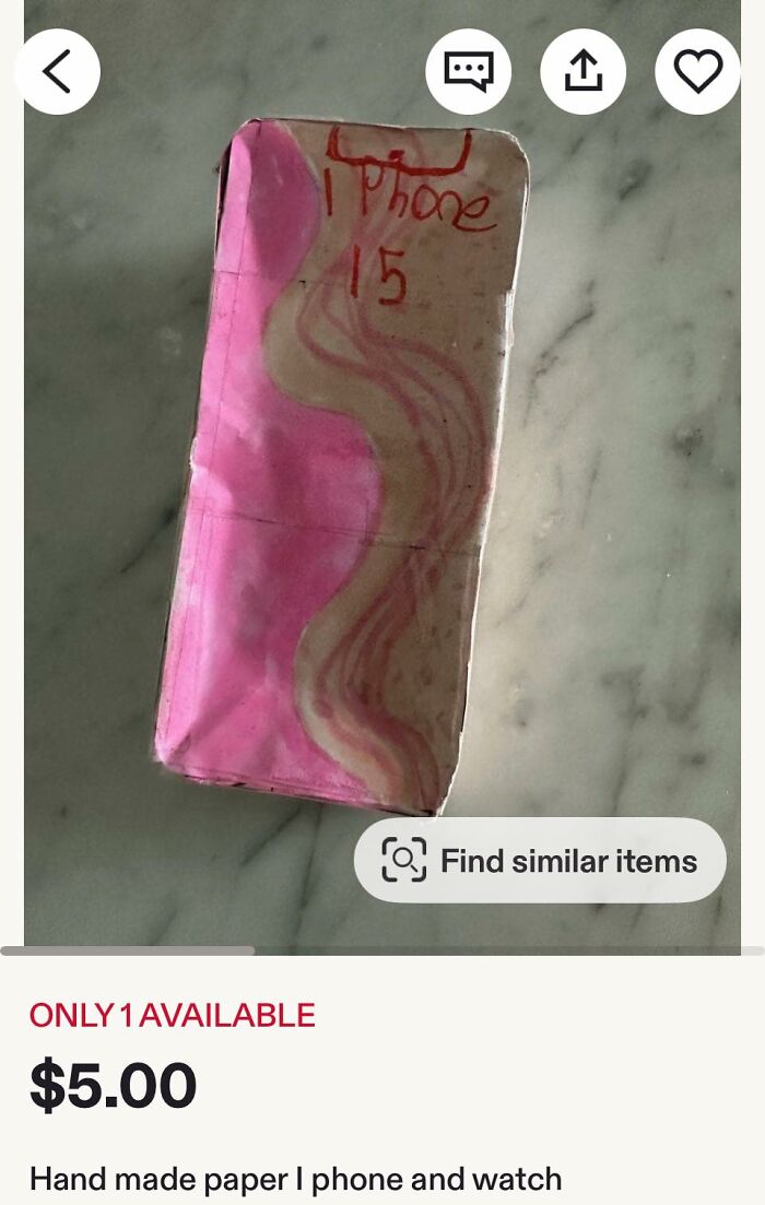 Handmade paper iPhone 15 case with pink and beige paint, showcasing a DIY craft shaming project.