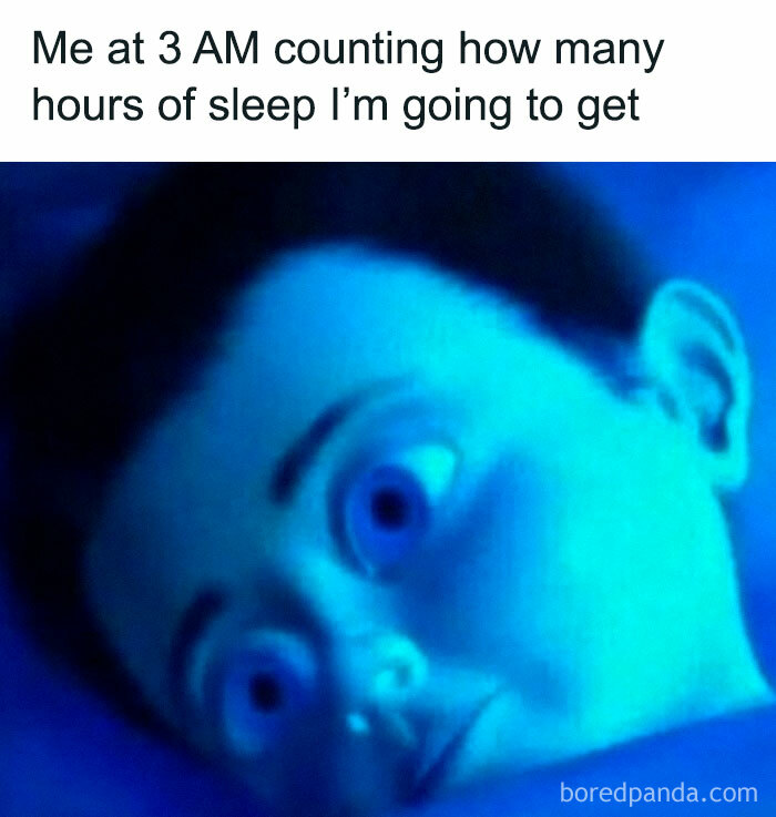 Person wide-eyed in bed at 3 AM, counting hours of sleep, representing introvert-worthy meme humor and accuracy.