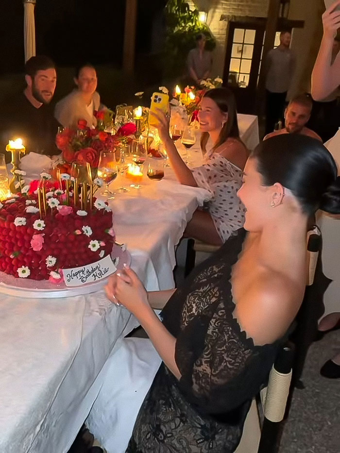 Kylie Jenner in a risqu&eacute; outfit at a candlelit dinner party amid breakup rumors without Timoth&eacute;e Chalamet.