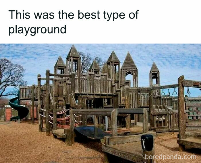 Wooden castle-style playground equipment at a park, evoking '90s nostalgia and childhood memories of outdoor play.