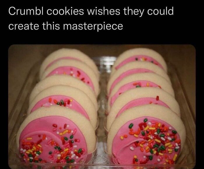 Pink frosted cookies with colorful sprinkles arranged neatly in a tray, evoking 90s nostalgia club vibes.