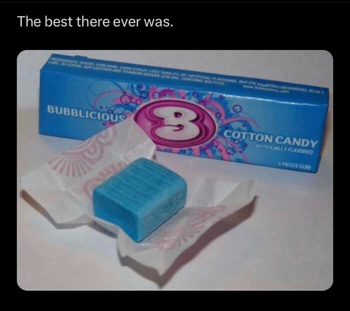 Blue cotton candy flavored 3 gum unwrapped with its packaging, evoking 90s nostalgia and childhood memories.