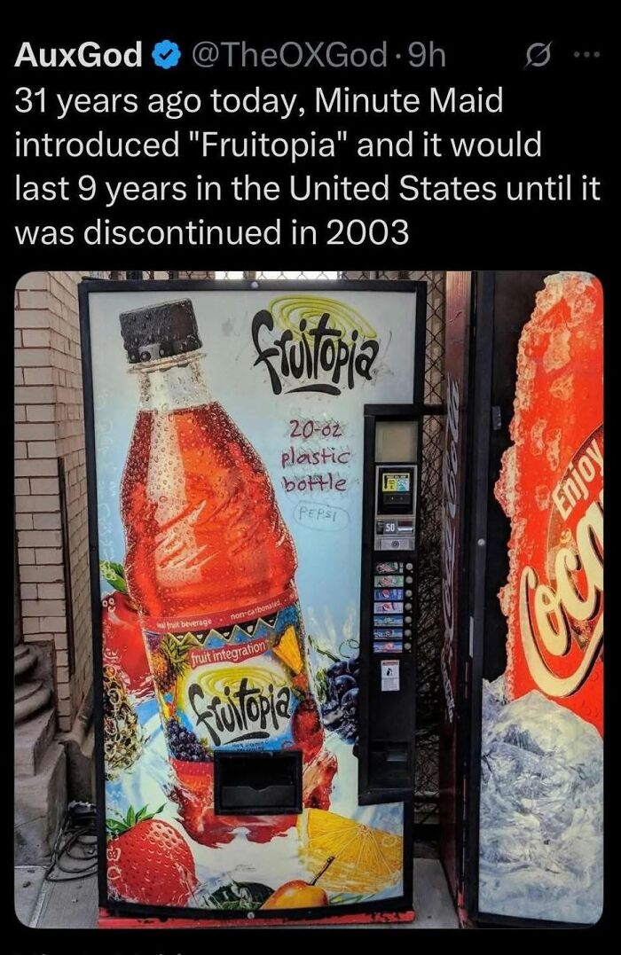 Vintage Fruitopia vending machine with bright fruit graphics, highlighting 90s nostalgia and iconic beverage branding.