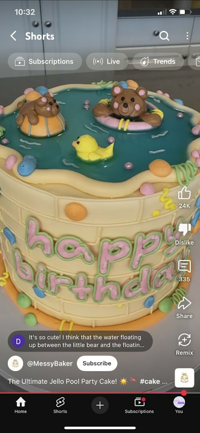 A birthday cake designed as a jello pool with bear and duck decorations, showcasing craft shaming DIY humor.