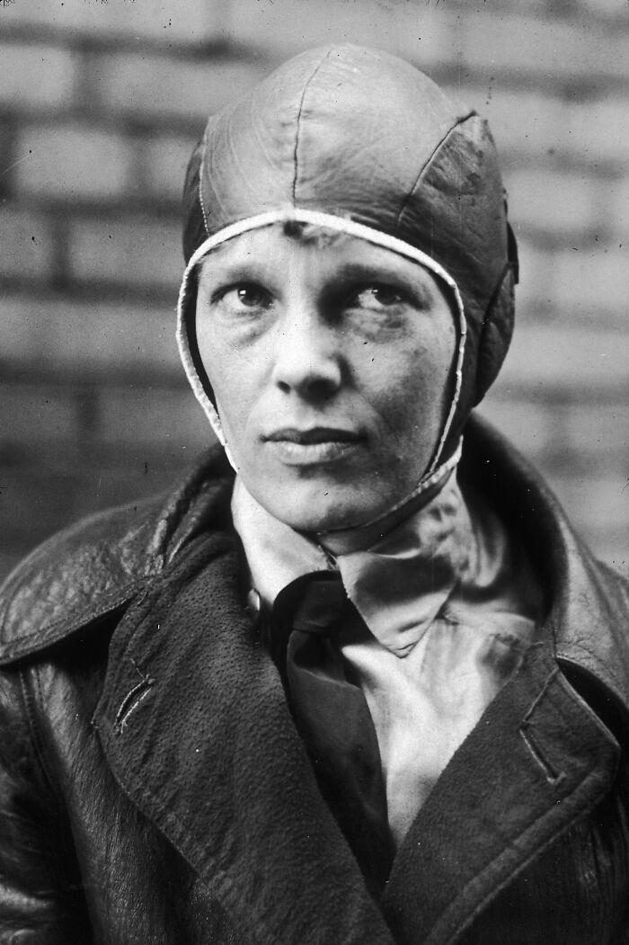 Black and white photo of a person in a leather aviator cap and jacket, symbolizing unsolved mysteries that still baffle people.