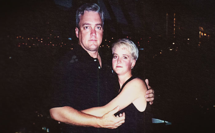 Man and woman embracing in a dark setting, related to Amy Bradley cruise ship mystery and overlooked detail. Man and woman embracing in a dark setting, related to Amy Bradley cruise ship mystery and overlooked detail.