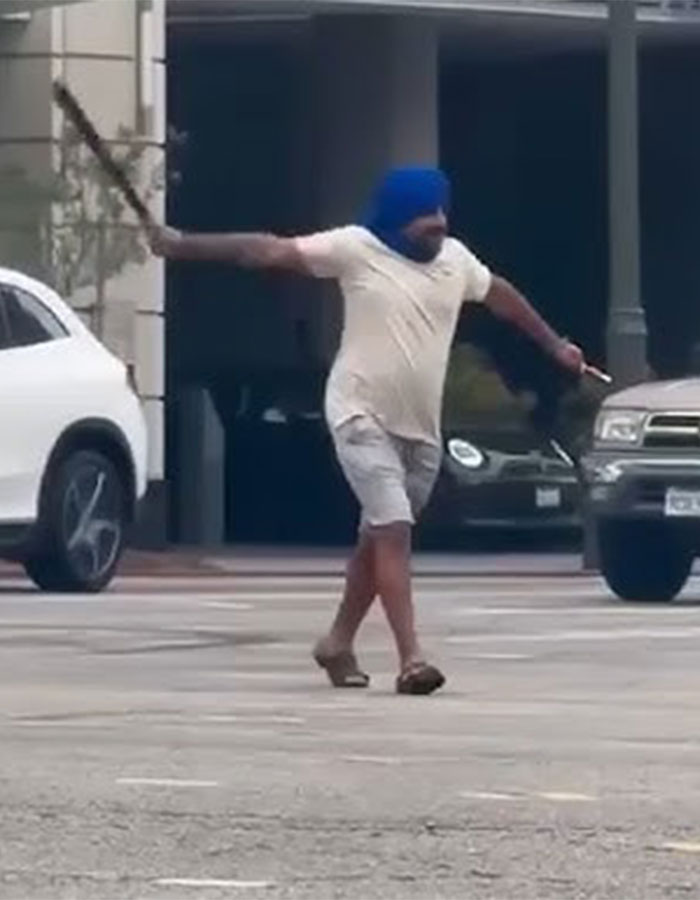 Man chasing in street holding machete during scary incident linked to woman who slept with 583 men in a day story.