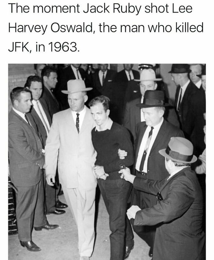 Black and white photo showing the moment Jack Ruby shot Lee Harvey Oswald, a creepy historical fact captured on camera.