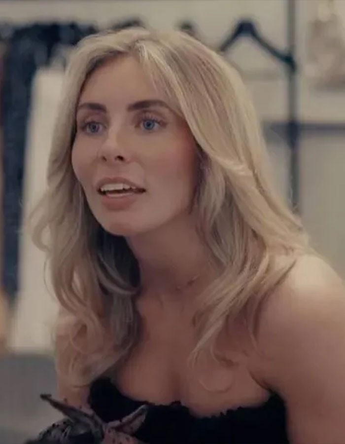 Blonde woman with blue eyes speaking in an indoor setting, discussing Bonnie Blue&rsquo;s career in a new documentary.