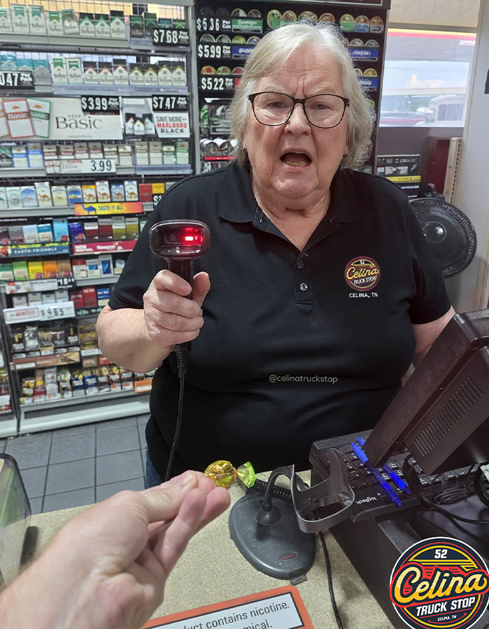 Elderly clerk scanning candy at Celina Truck Stop believed to be the real location of viral impossible to visit truck stop. Elderly clerk scanning candy at Celina Truck Stop believed to be the real location of viral impossible to visit truck stop.