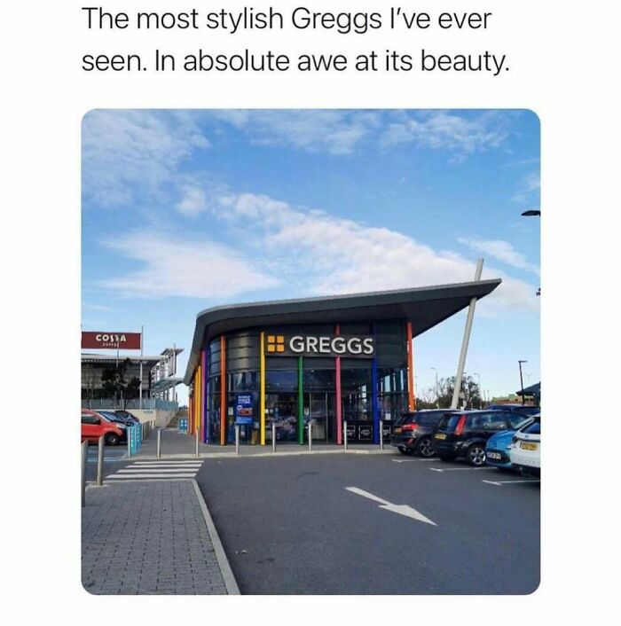 Stylish Greggs bakery with colorful pillars and modern design in a UK parking lot under a blue sky.