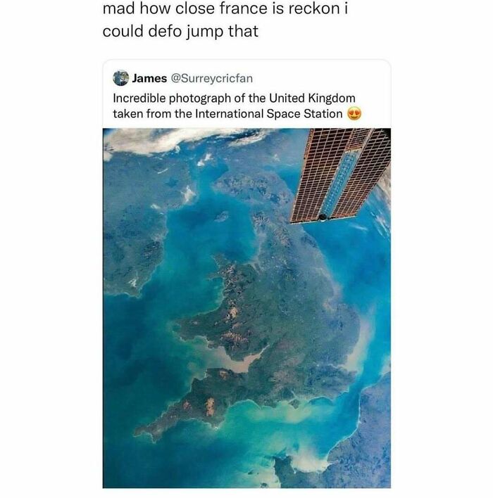 A humorous British meme showing a satellite image of the United Kingdom from space with a funny caption.