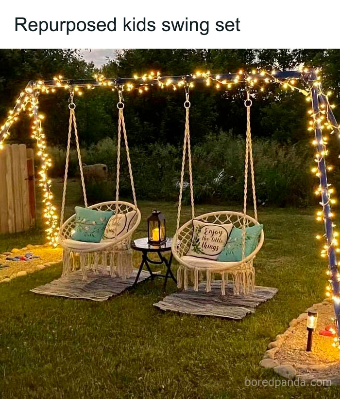 Repurposed kids swing set with fairy lights and cozy cushions showcasing ingenious crafty ideas for outdoor fun.