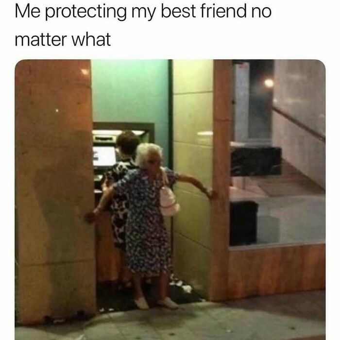 Elderly woman standing protectively in a doorway, symbolizing introvert-worthy memes about friendship and protection.