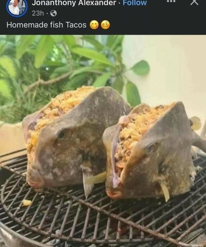 Two fish heads filled with taco ingredients placed on a grill, showcasing broken sense of humor memes.
