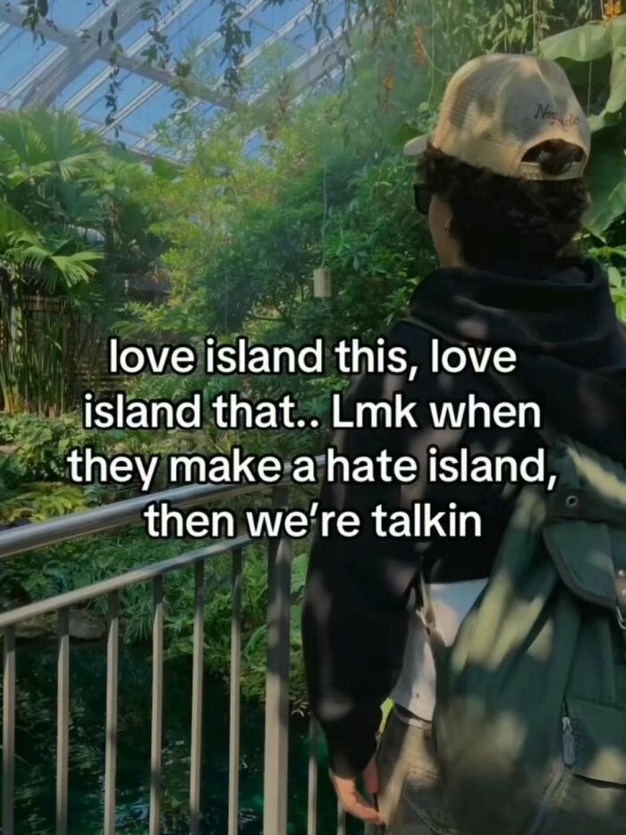 Person in a hat and backpack standing in a greenhouse with meme text referencing a broken sense of humor about love island.