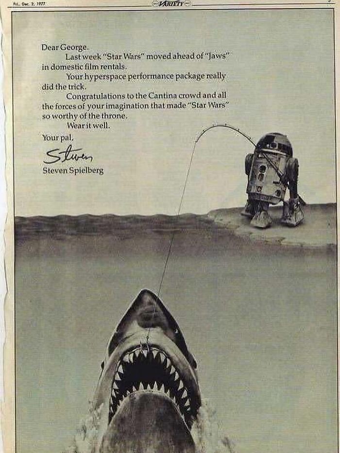 Vintage black and white ad with old-timey robot fishing for shark, evoking nostalgia for June Cleavers vintage closet era.