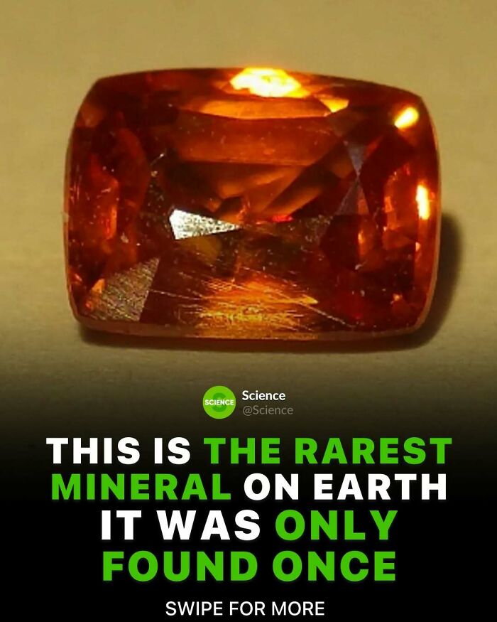 Close-up of the rarest mineral on Earth with a deep orange color, highlighting cool and interesting science facts.