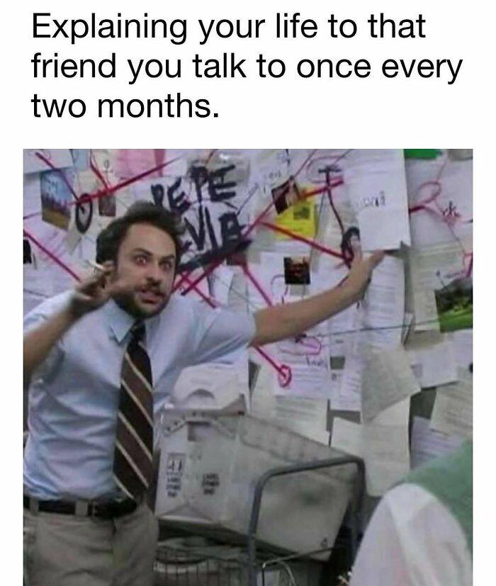 Man in shirt and tie explaining complex theory with papers and red strings on wall, depicting hilarious memes and good vibes.