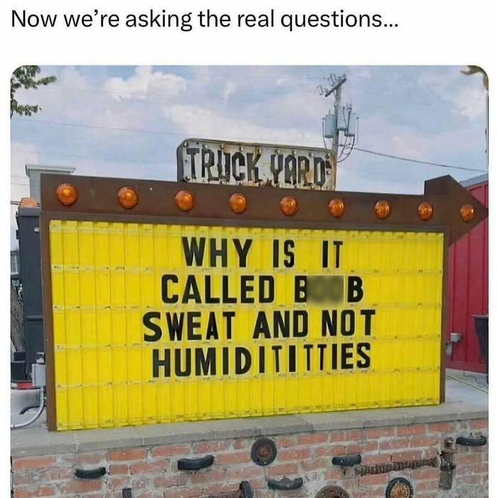 Humorous outdoor truck yard sign questioning why sweat is not called humidity in a relatable introvert-worthy meme.