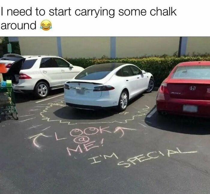 White car parked with chalk drawings around it reading look at me and I'm special, introvert-worthy memes concept.
