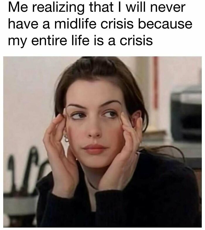 Woman holding her head with a stressed expression, illustrating a relatable moment for hilarious memes and good vibes.