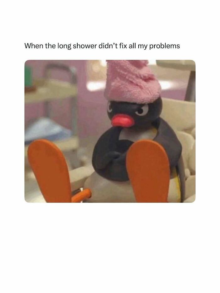 Angry cartoon penguin with pink towel on head sitting down, representing hilarious memes for daily laughter and good vibes.