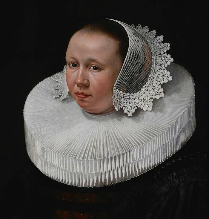 Portrait of a historical figure wearing a traditional lace ruffled collar, showcasing a famous historical photo with a compelling backstory.