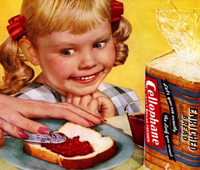 Vintage advertisement showing a smiling child watching jam spread on bread near packaged enriched bread loaf.