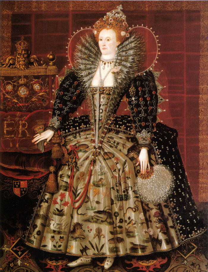 Portrait of a royal woman in elaborate 16th-century attire showing historical beauty standards through striking fashion.