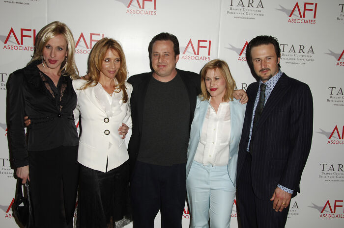 Group of legendary entertainment families posing together at an event, showcasing generations passing the spotlight down.