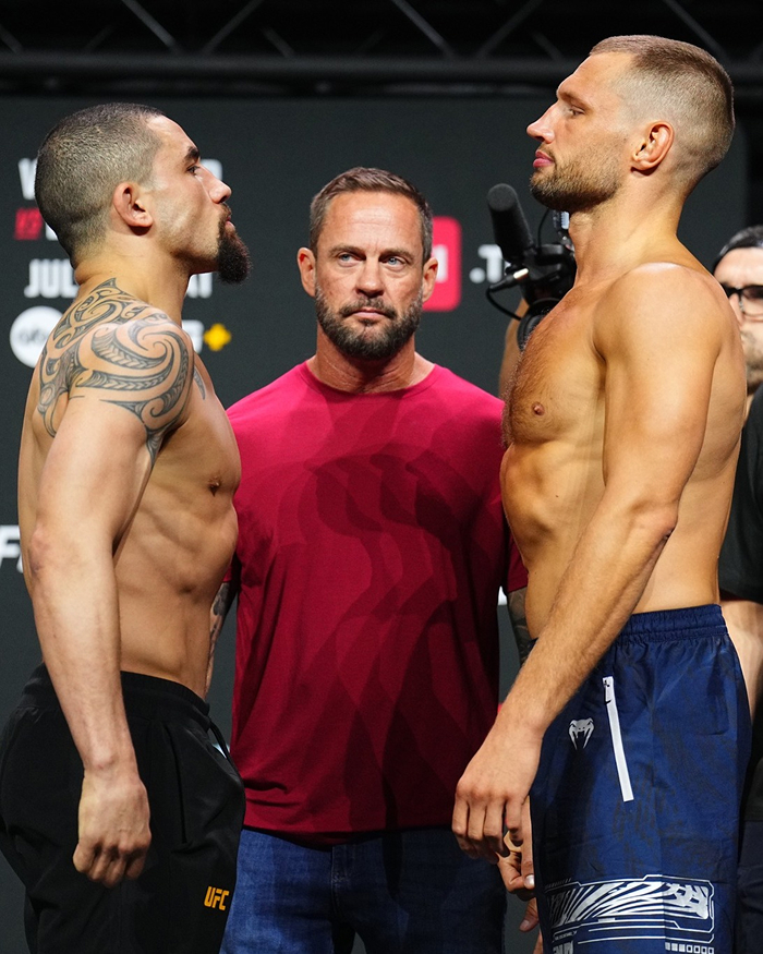Two UFC fighters facing off during weigh-in as Dana White's net worth growth with UFC pay-per-view events is highlighted.