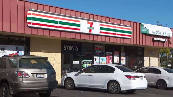 7-Eleven storefront with parked cars in front, related to horrific roommate of manager incident news.