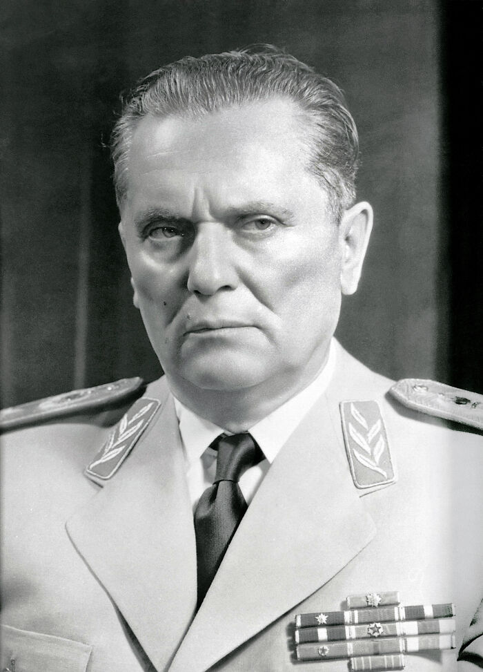 Black and white portrait of a stern man in military uniform representing savage roasts and comebacks concept.