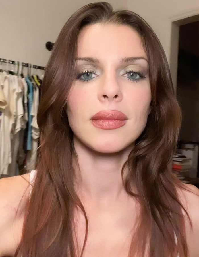 Julia Fox close-up selfie with makeup, highlighting her facial features amid discussions about plastic surgeries.