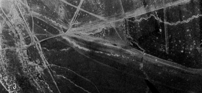 Aerial view of 20th century World War I trenches and battle lines showing the impact of warfare on the landscape.