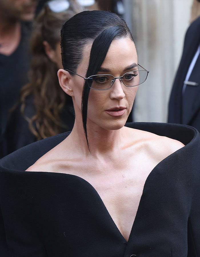 Katy Perry wearing glasses and a black outfit, attending an event related to renting Chris Pratt 15 million property. - 1