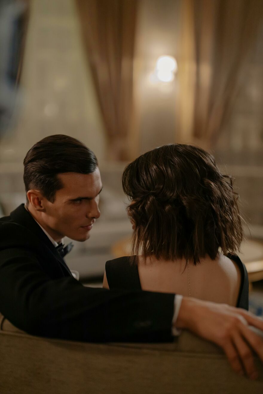 Man and woman in an intimate setting, highlighting cheating behavior and the closing gender gap in relationships.