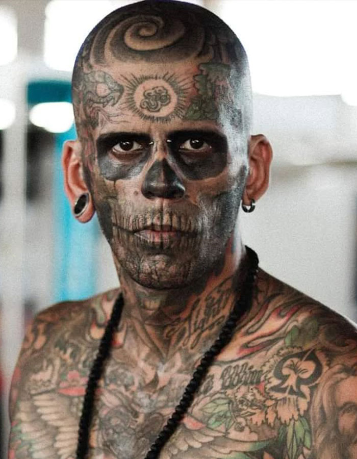 95% tattooed man with skull face tattoos and extensive body ink revealing dramatic new look after tattoo removal