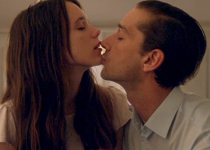 Couple in an intimate moment, illustrating times movie stars were actually doing the deed during love-making scenes on film.